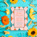 Personalized colorful wedding invitation with modern retro geometric pattern, couple’s names, wedding date, venue, reception details, and dress code-front