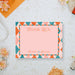 Personalized colorful geometric wedding thank you card with blush pink background, couple names, and space for handwritten message-front