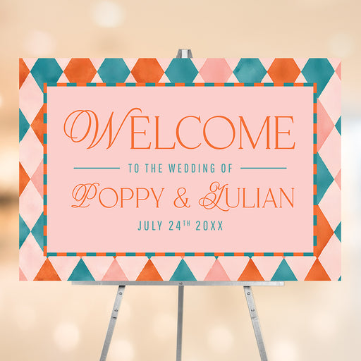 Welcome guests with a personalized wedding sign featuring your names, wedding date and a colorful coral, blush and teal geometric diamond pattern.