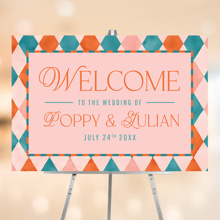 Welcome guests with a personalized wedding sign featuring your names, wedding date and a colorful coral, blush and teal geometric diamond pattern.
