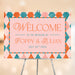 Welcome guests with a personalized wedding sign featuring your names, wedding date and a colorful coral, blush and teal geometric diamond pattern.