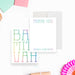 White personalized mitzvah thank you note card with pastel lettering, beside a back with large multicolored Bat Mitzvah typography.