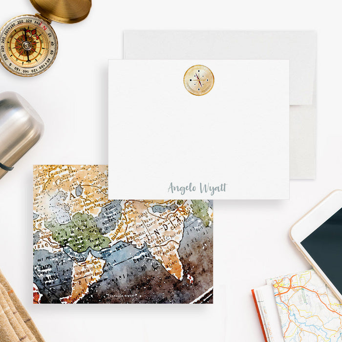Front and back of personalized note cards with a printed vintage compass illustration and a personalized name and a vintage map illustration on the back.