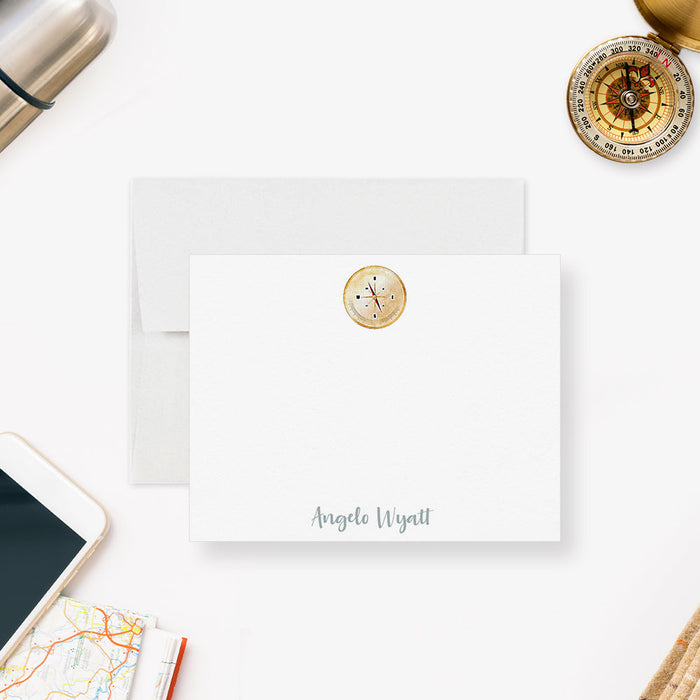 Personalized note card with a printed vintage compass illustration and a personalized name, shown with a white envelope.