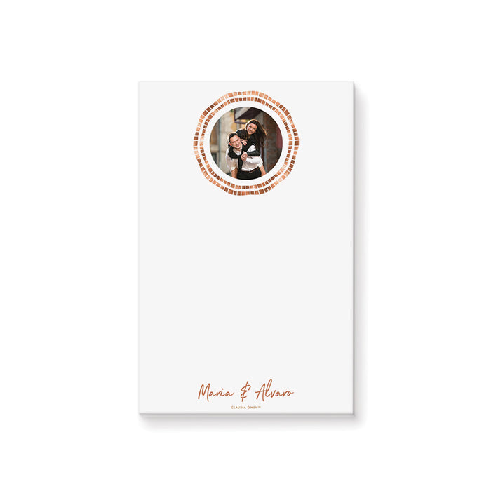 Personalized couple photo notepad with circular photograph, double geometric border in warm copper and peach, names and blank writing space
