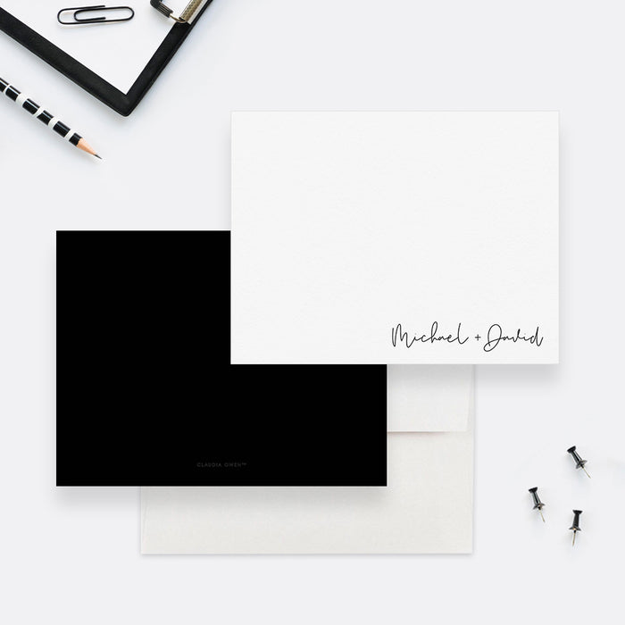 Minimalist personalized couples note card with two names in black script at the lower right, shown with a white envelope-front-back