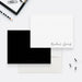 Minimalist personalized couples note card with two names in black script at the lower right, shown with a white envelope-front-back