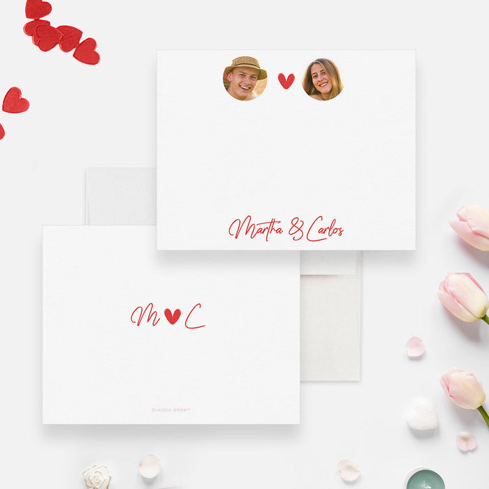 Front and back of personalized note cards with couple portraits, a red heart and personalized names in red script and a red heart and initials design on the back.