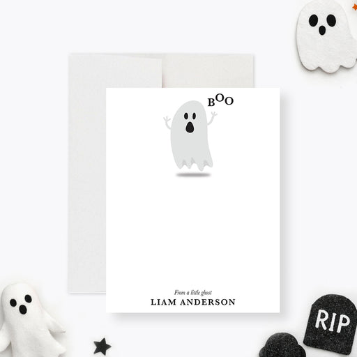 Front and back of personalized kids Halloween note card with cute gray ghost, Boo wording, blank writing space and child’s name-front
