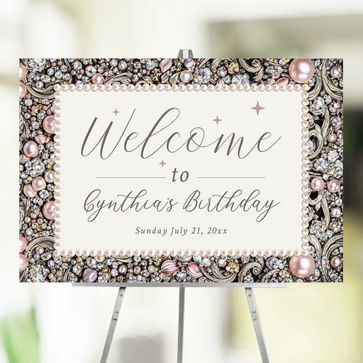 Personalized birthday welcome sign with Cynthia’s Birthday wording, event date and ornate border of blush pearls, clear jewels and scrollwork
