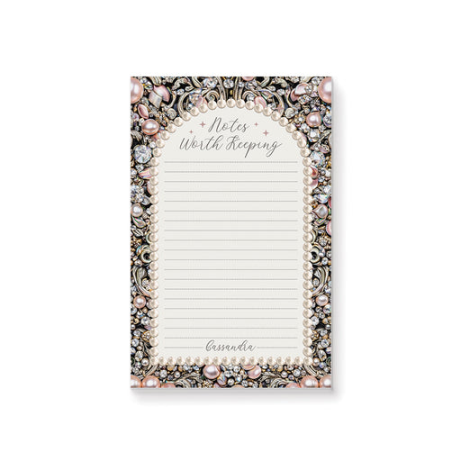 Personalized lined notepad with Notes Worth Keeping heading, custom name and ornate border of blush pearls, clear jewels and scrollwork