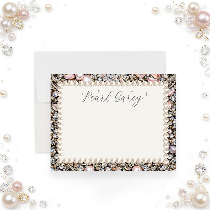 Personalized note card with custom name and ornate border of blush pearls, clear jewels and scrollwork-front