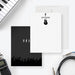 Front and back of personalized note cards with a black electric guitar illustration and a personalized name and a black concert inspired back with initials and a cheering crowd.