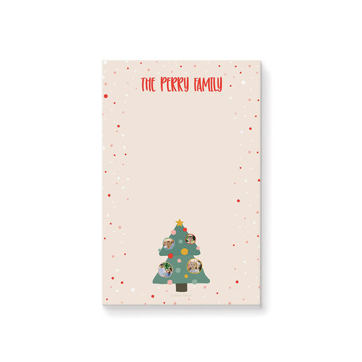 Personalized Christmas notepad with family photos in colorful ornaments on a festive tree