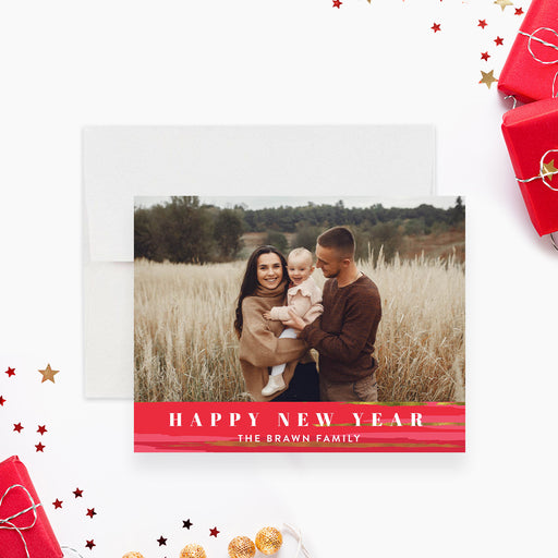 Happy New Year family photo greeting card with red watercolor brushstroke design and festive holiday accents-front
