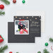 Personalized family photo holiday card with a winter sledding photo, cream snowflakes and Happy Holidays greeting on a charcoal background-front-back
