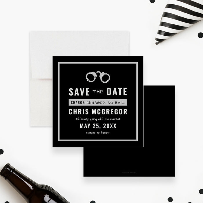 Personalized funny bachelor party save the date card with silver handcuffs, groom’s name, humorous charge wording and event date-front-back