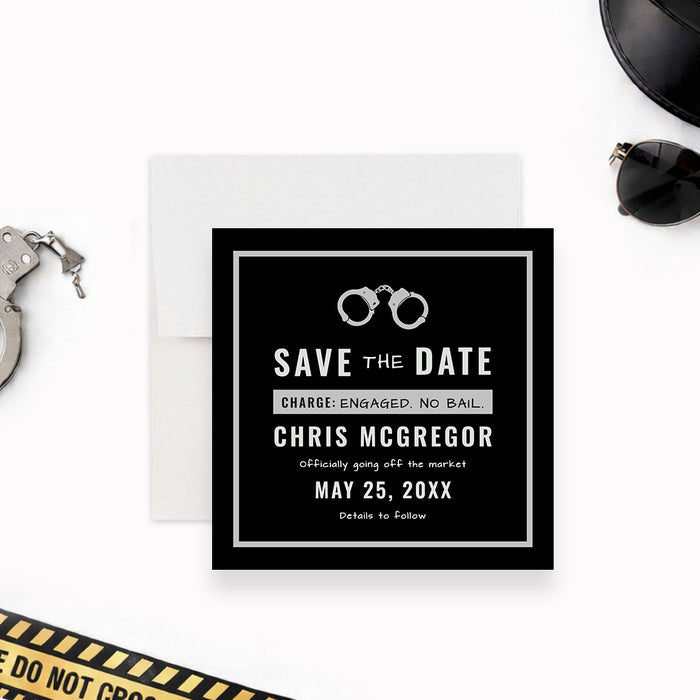 Personalized funny bachelor party save the date card with silver handcuffs, groom’s name, humorous charge wording and event date-front