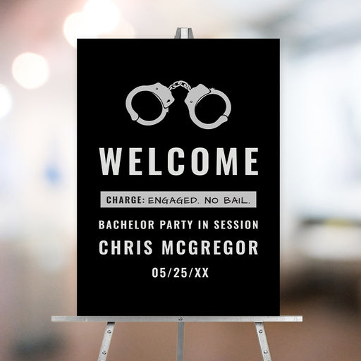 Personalized funny bachelor party welcome sign with silver handcuff graphic, groom’s name, event date and Charge Engaged No Bail wording