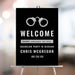 Personalized funny bachelor party welcome sign with silver handcuff graphic, groom’s name, event date and Charge Engaged No Bail wording