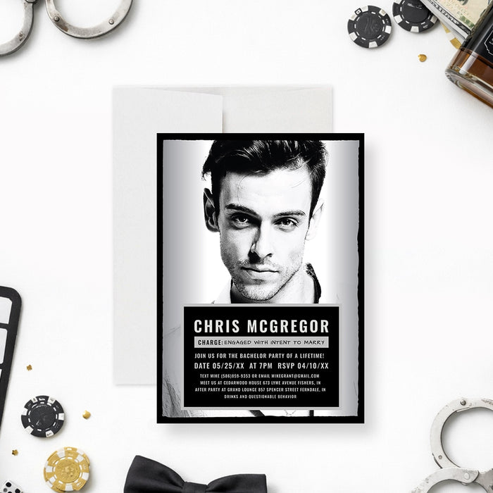 Personalized mugshot bachelor party invitation with groom’s black-and-white photo, name, funny charge wording and custom event details-front