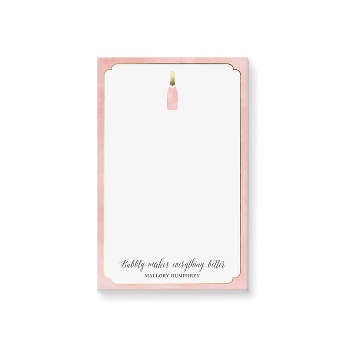 personalized blush pink champagne notepad with champagne bottle illustration, elegant border, custom name, and blank writing space