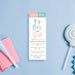 Personalized boy or girl gender reveal ticket invitation in aqua blue and coral pink with baby footprints, party details, and Admit One wording