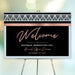 Personalized corporate annual dinner welcome sign with geometric black-and-white pattern, blush accents, company name and event date