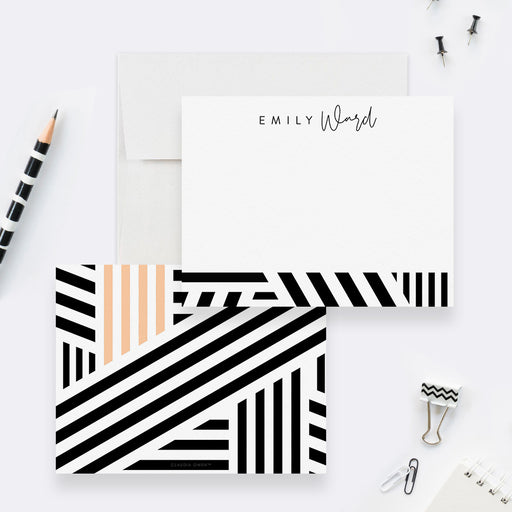 Personalized note cards with black and white geometric stripes, peach accent bars and a custom name on the front.