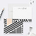Personalized note cards with black and white geometric stripes, peach accent bars and a custom name on the front.
