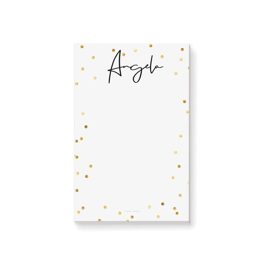 Personalized white notepad with a custom name in black script and elegant gold confetti border on a minimalist stationery design.
