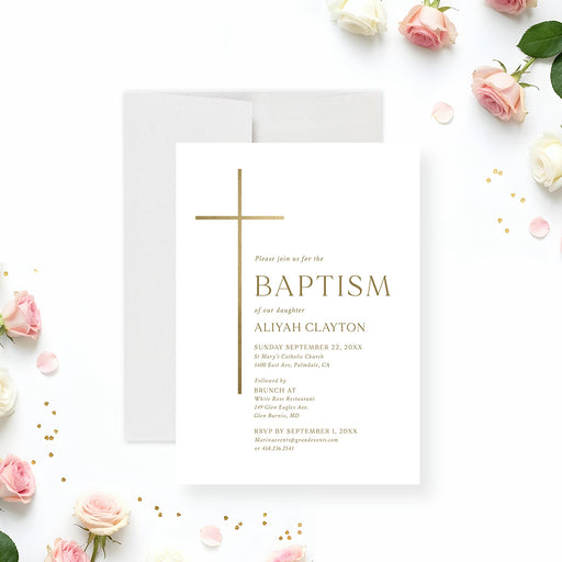 White baptism invitation with a slender gold cross, classic serif lettering, and soft pink roses-front