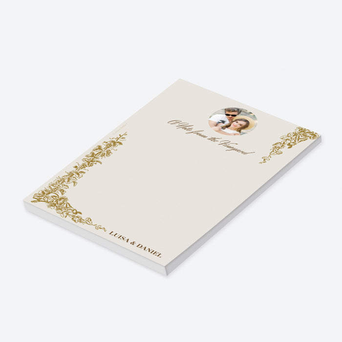 Personalized gold grapevine vineyard wedding notepad with ornate corner border, A Note from the Vineyard, custom couple’s photo, and names-side