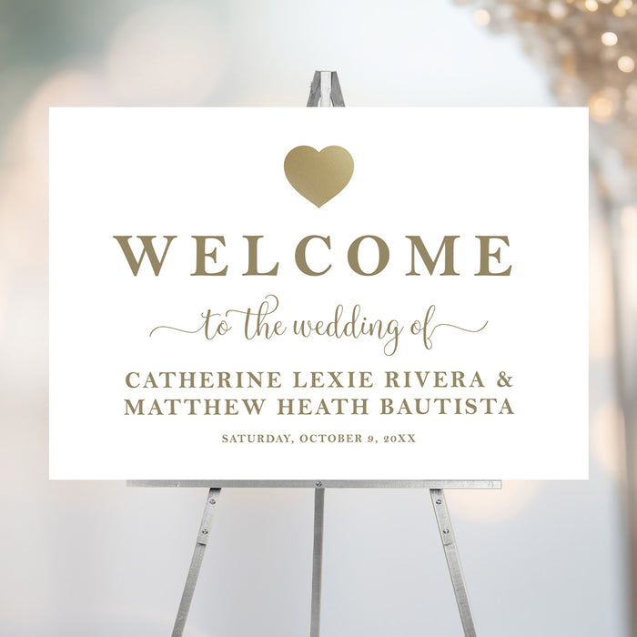 Personalized white wedding welcome sign with elegant gold lettering, a gold heart, couple’s names and wedding date