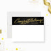 Black and gold graduation congratulations note card with elegant script calligraphy and Class of 2026 design on premium cardstock-front