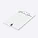 personalized navy champagne notepad with custom name in script, lined writing space, and small champagne bottle illustration-side