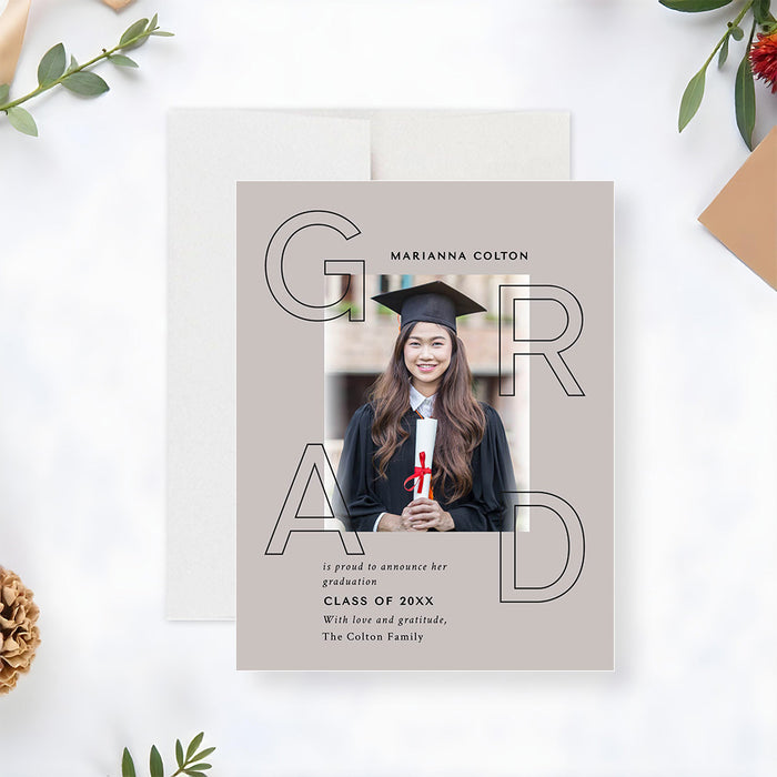 Modern graduation announcement card featuring a photo of the graduate with bold GRAD typography and a personalized message-front