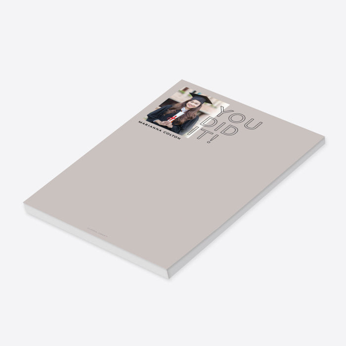 Personalized graduation notepad featuring a graduate photo with “You Did It” text on neutral background-side