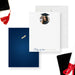 Front and back of personalized note cards with a graduate portrait in a cap, a name and graduation year and a navy back with a diploma illustration.