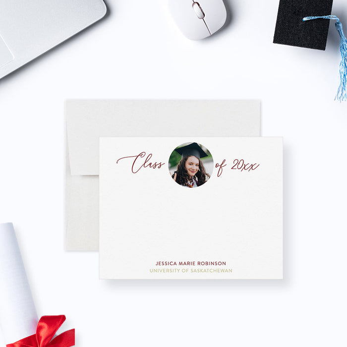 Personalized note card with Class of wording, a graduate portrait and personalized graduation details, shown with a white envelope.