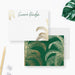 Personalized note cards with printed gold palm trees on a white front and green reverse with a gold palm pattern.