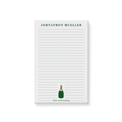 Personalized champagne bottle notepad with green bottle artwork, custom name, and lined pages