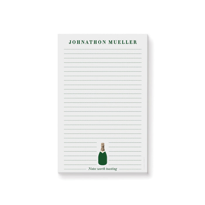 Personalized champagne bottle notepad with green bottle artwork, custom name, and lined pages