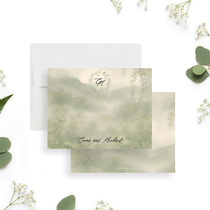 Personalized wedding note card with leafy monogram wreath, Emma and Michael names, misty sage watercolor landscape and delicate wildflowers-front-back