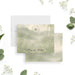 Personalized wedding note card with leafy monogram wreath, Emma and Michael names, misty sage watercolor landscape and delicate wildflowers-front-back