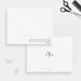 Personalized white hair stylist note cards with comb and scissors artwork on the front and initials with a hairdryer illustration on the reverse.