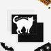 Black and white Halloween cat note card with a large cat-shaped writing area, textured background and Purr-fectly Spooky wording along the tail-front-back