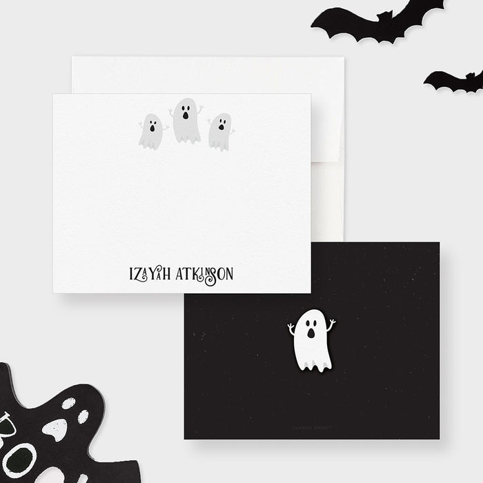 Front and back of personalized note cards with three friendly ghosts and a personalized name and a dark back with a ghost illustration.