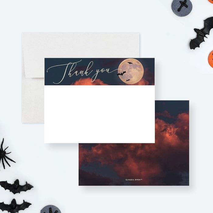 Halloween thank you card with full moon, flying bats, dark orange clouds, and blank space for a handwritten note-front-back