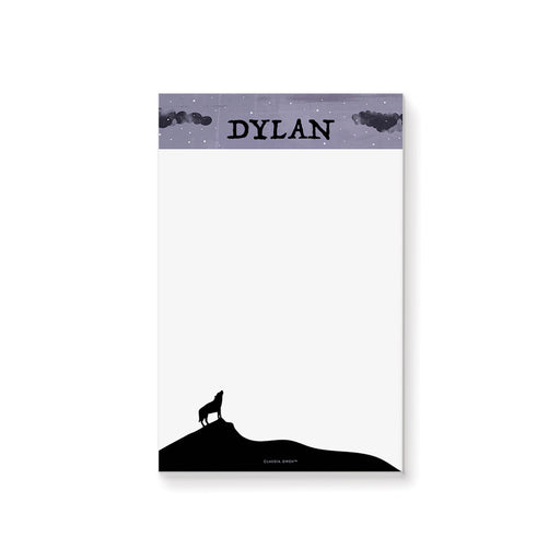 personalized Halloween notepad with howling wolf silhouette, starry purple sky, custom name, and blank writing space